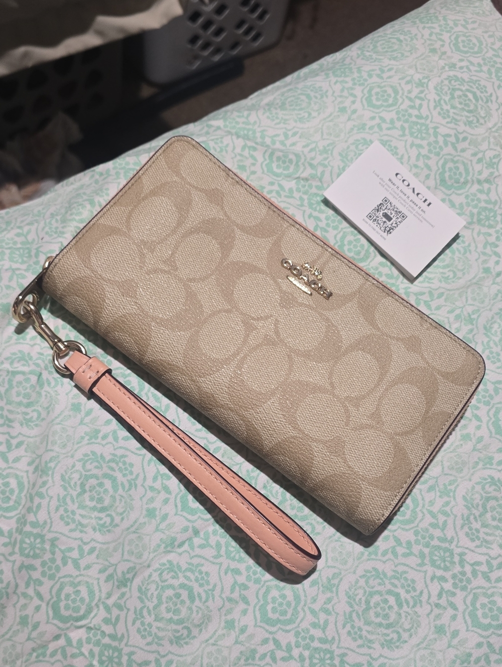 Coach Beige Signature Zip Wristlet with Pink Strap